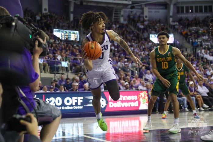 Micah Peavy keeping ball inbounds against Baylor on February 26, 2024.